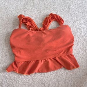orange bikini top with tie back long strings with ruffle straps.